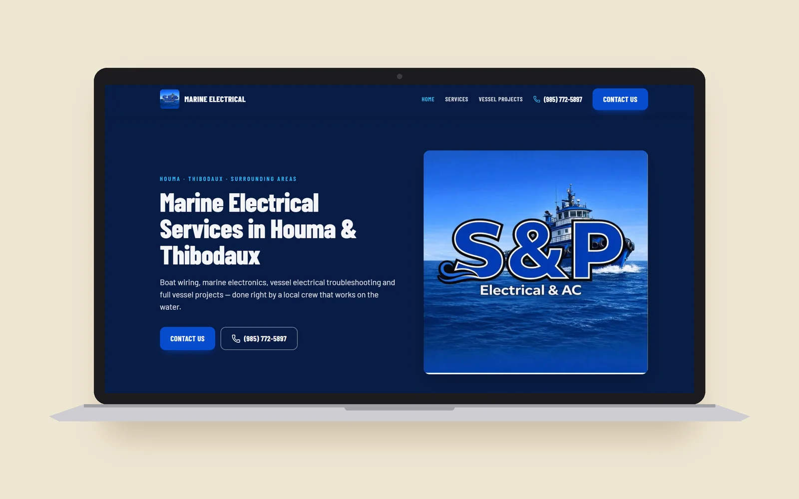 S&P AC And Electrical marine electrical website shown on a laptop